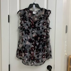 Cabi sleeveless top with ruffle detail.
